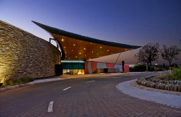 Maropeng — Tumulus entrance canopy at dusk
